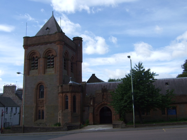 Gardner Memorial Church in Brechin, showing its red sandstone tower and entrance range