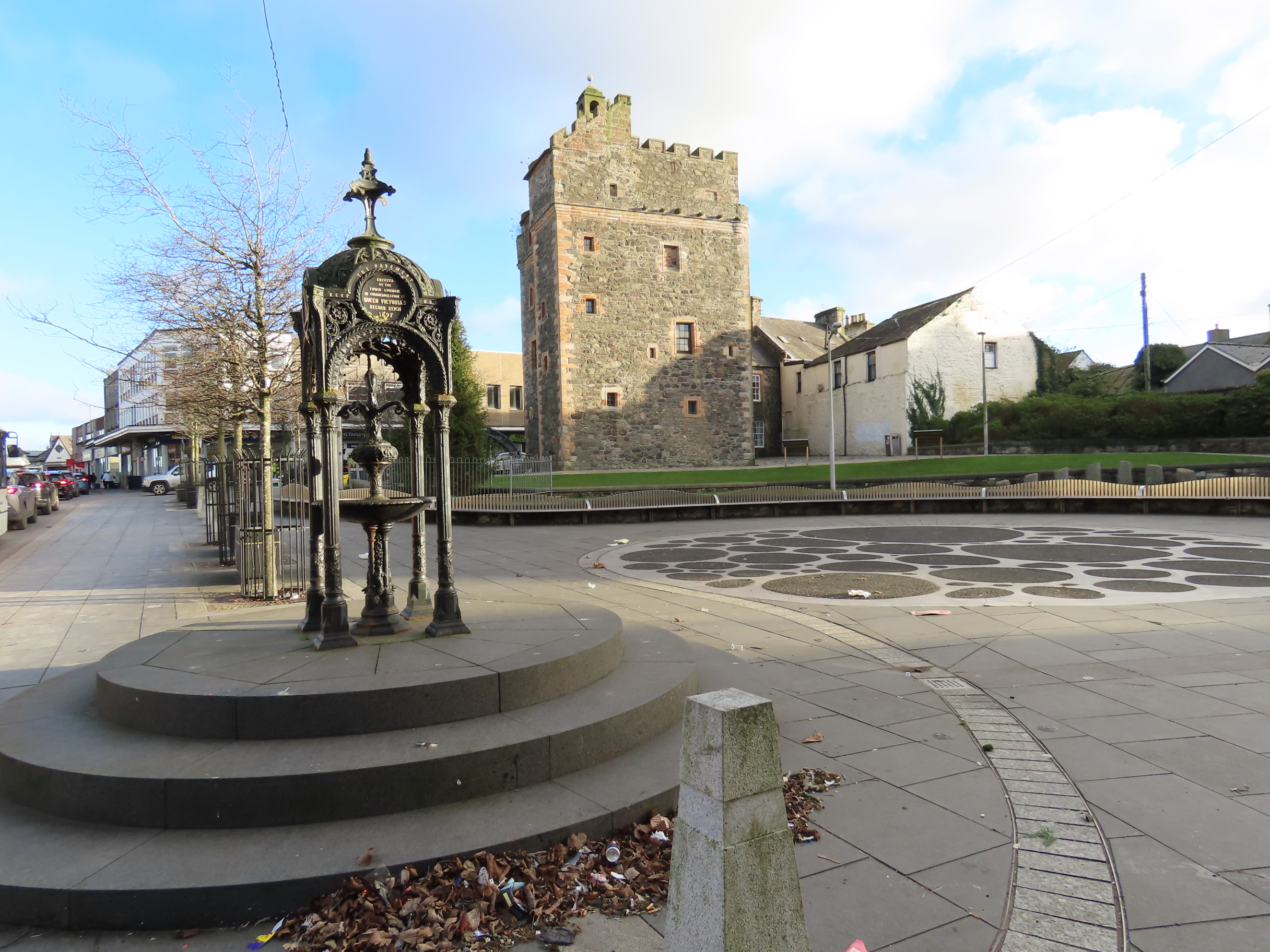 Tower of the Castle of St John in central Stranraer, seen beyond the town’s ornate war memorial