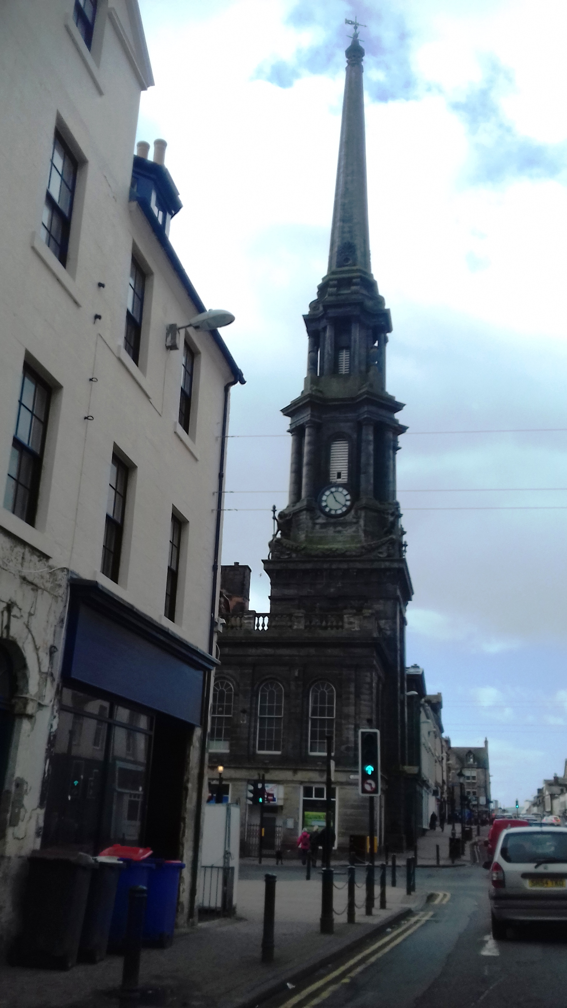 Ayr Town Hall’s stone frontage and tall classical clock tower.