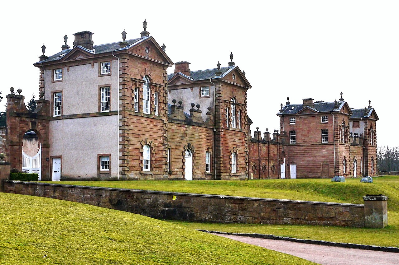 Chatelherault Hunting Lodge seen across its lawns, with its long symmetrical Baroque frontage and central entrance