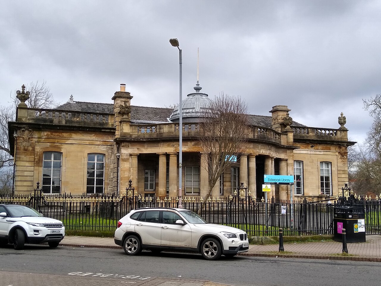 The red sandstone exterior and entrance of Elder Park Library in Govan