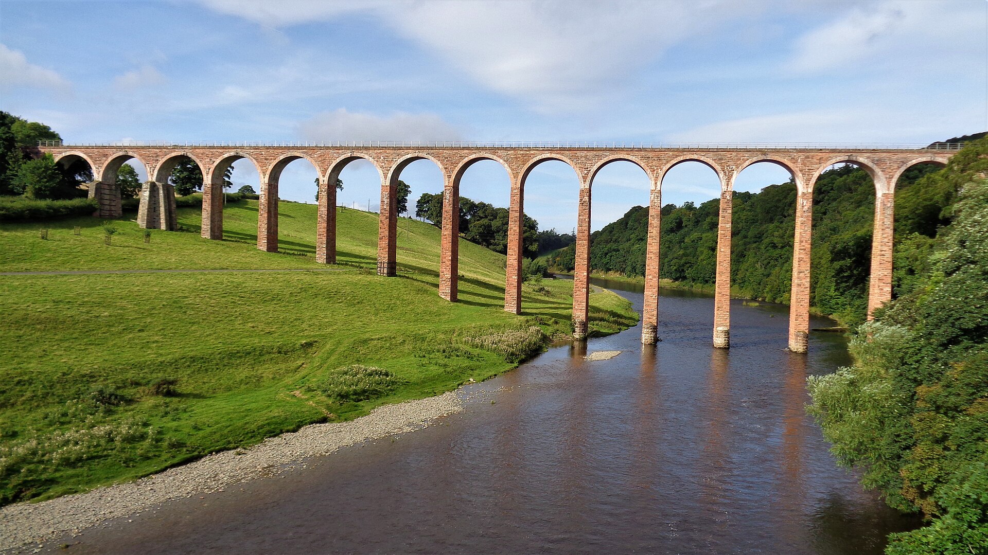 Leaderfoot Railway Viaduct carrying a long series of stone arches across the Tweed valley