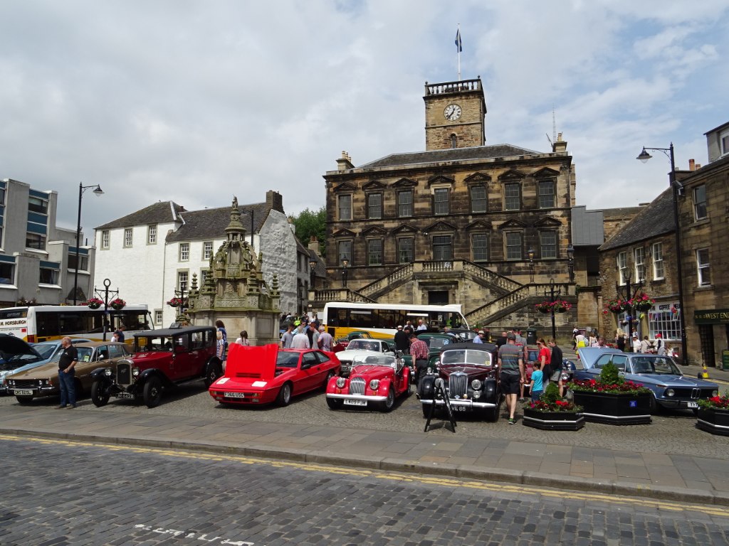 Linlithgow Burgh Halls at the Cross, with the stone clock tower above the street.