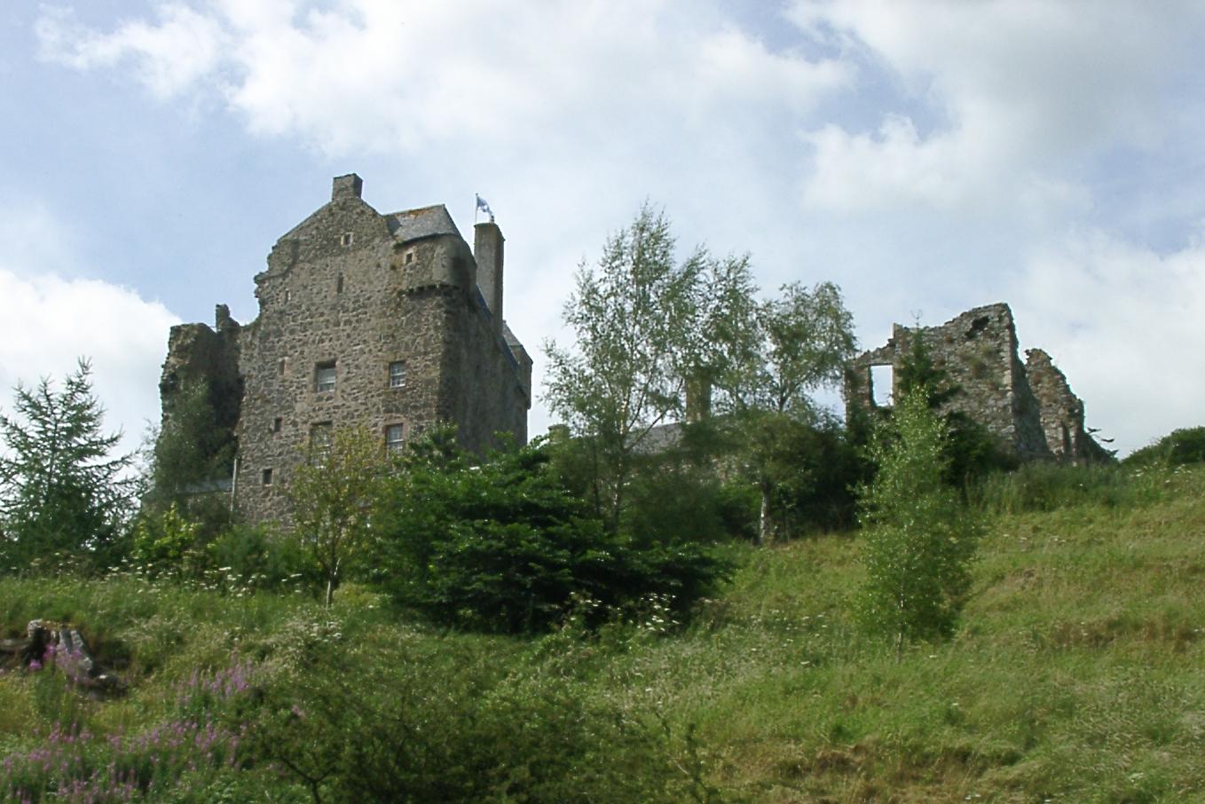 Neidpath Castle rising above wooded ground near Peebles