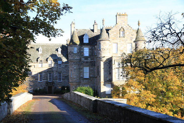 Cullen House seen across its wooded policies