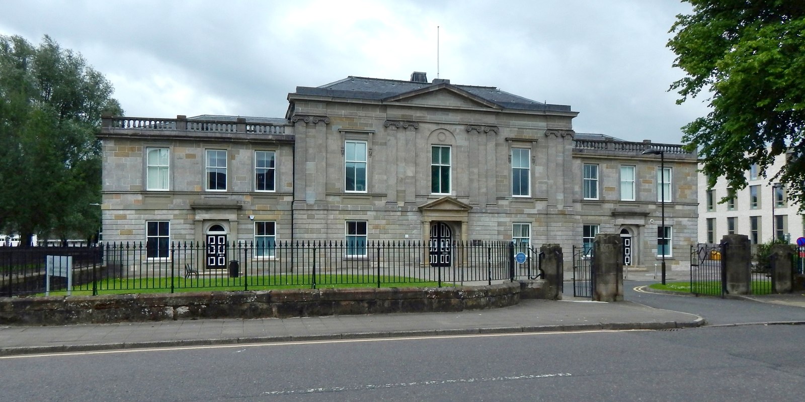 Dumbarton Sheriff Court on Church Street, a red-sandstone civic building with a central entrance and gabled bays