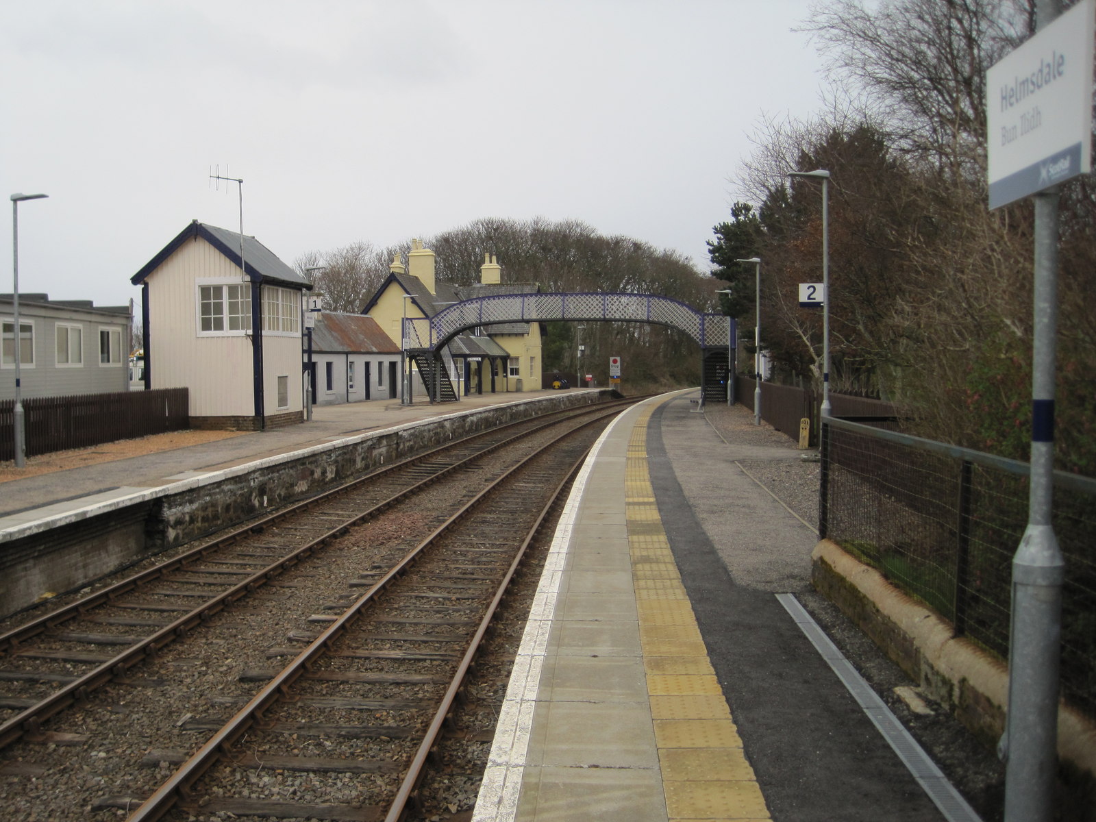 Helmsdale Railway Station, looking south along the platforms past the listed station buildings