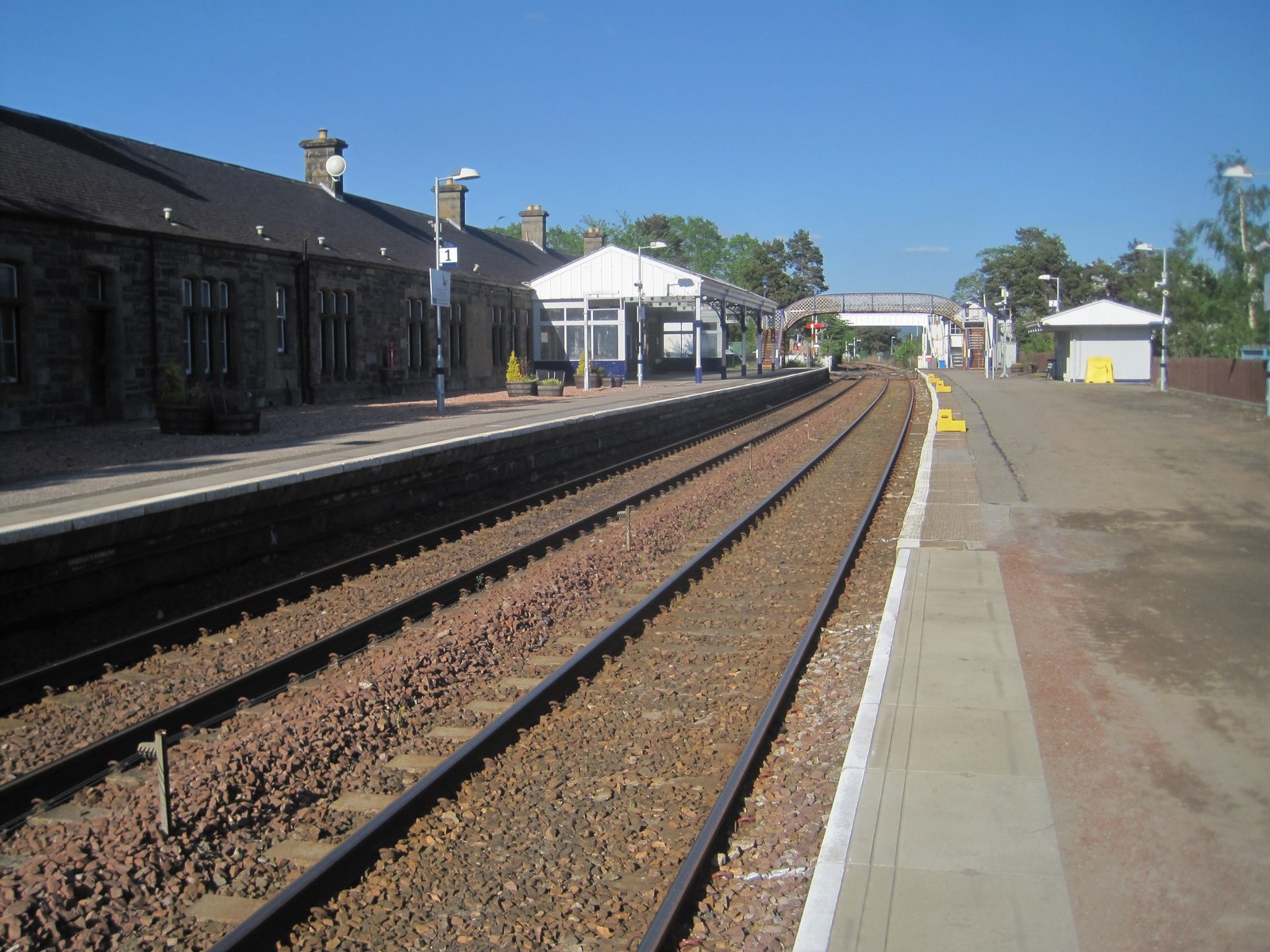 Kingussie Railway Station, showing the listed station building and platform