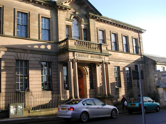The classical stone frontage and columned entrance of the Lindsay Institute, now Lanark Library.