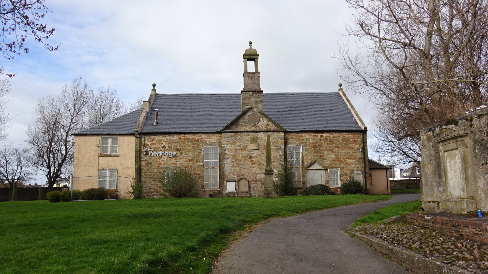 North Ayrshire Heritage Centre in Saltcoats, the former red-sandstone parish church seen across its churchyard