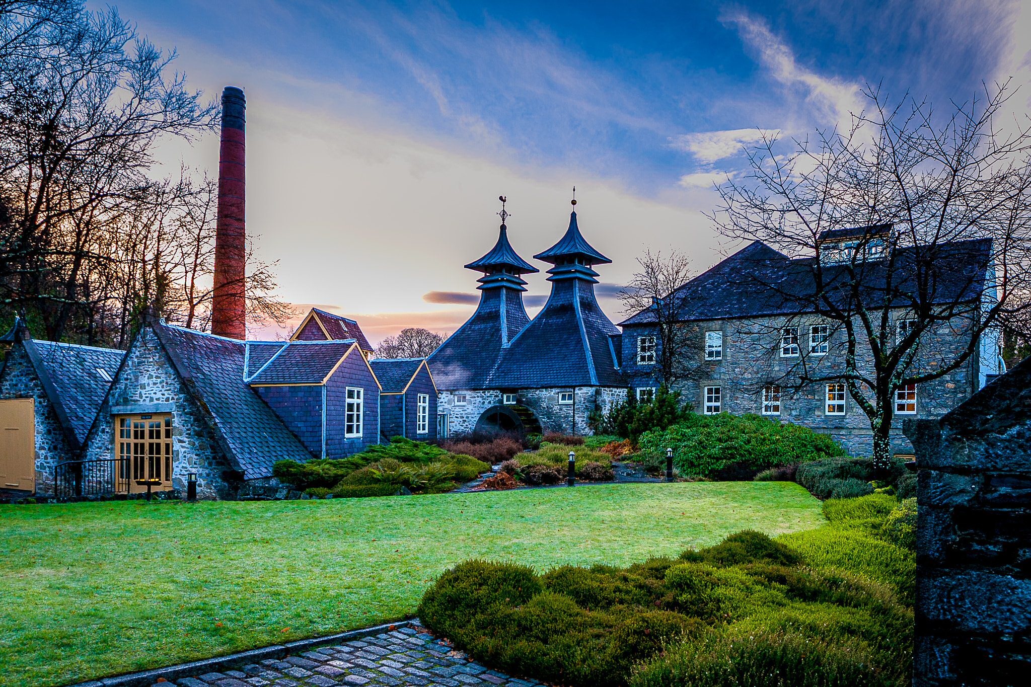 Strathisla Distillery in Keith, with pagoda roofs reflected in the water
