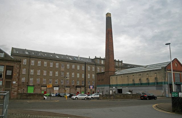 The long industrial frontage and chimney of Tay Works in Dundee.