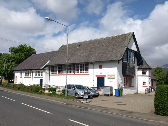 Arran Library and Brodick Hall at Invercloy, showing the harled frontage and steeply pitched roof