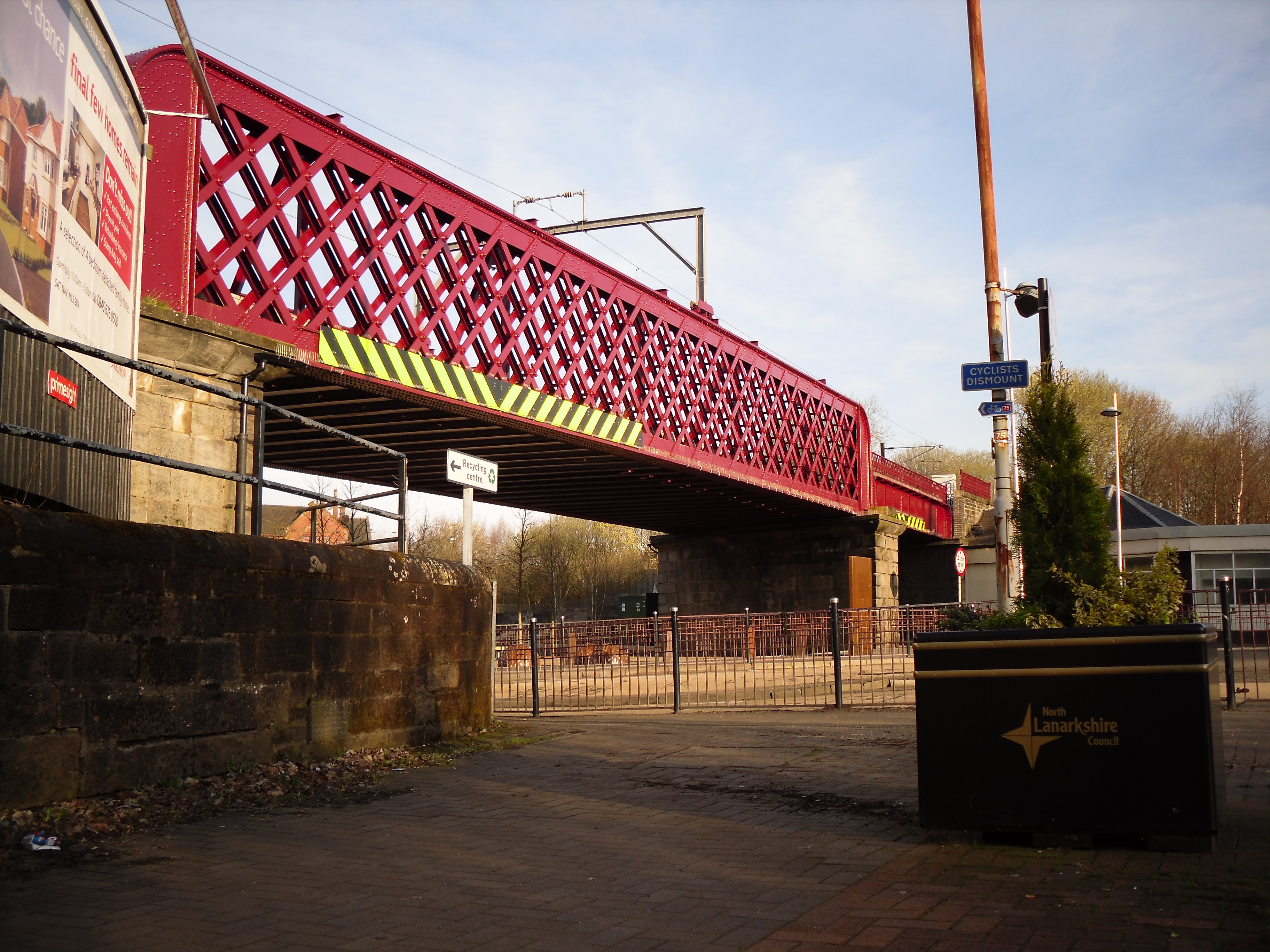 The wrought-iron lattice railway bridge spanning Coatbridge Cross above Bank Street