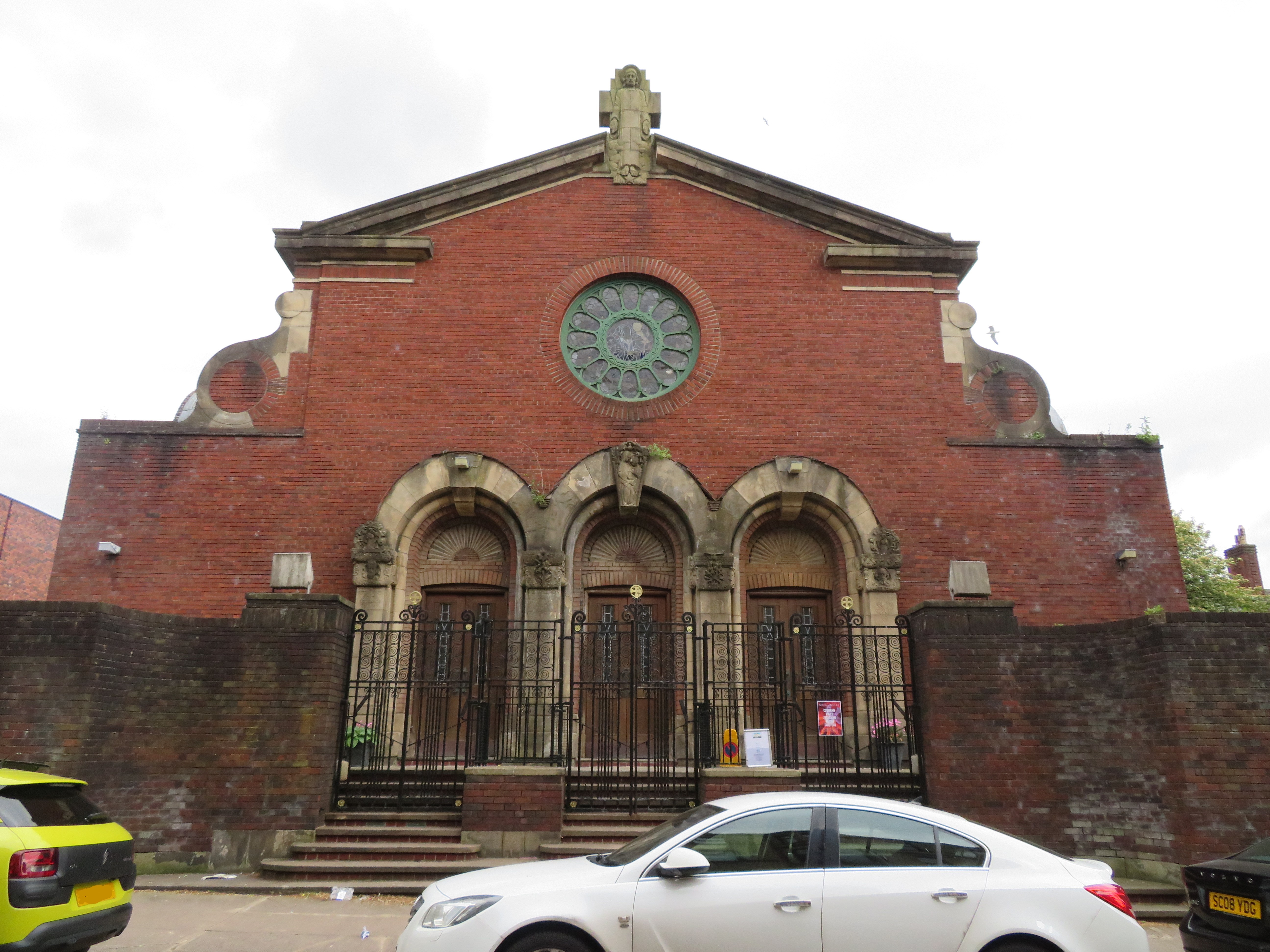 The red sandstone west front and tower of St Anne’s Church in Dennistoun