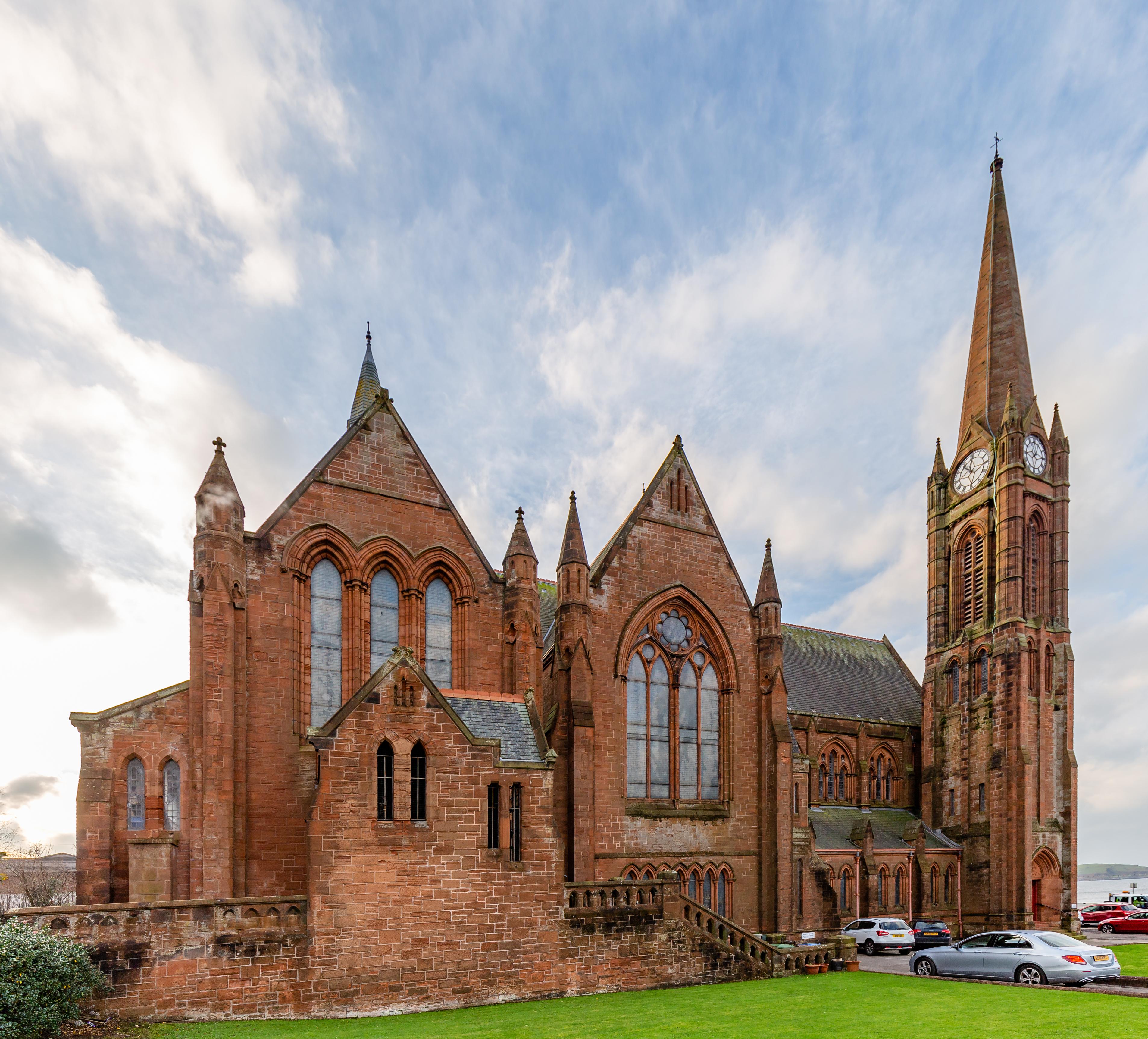 Former St Columba’s Parish Church in Gallowgate Street, Largs, showing the red-stone church and tall spired clock tower